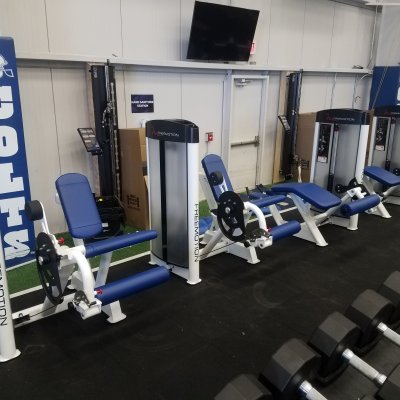 a row of leg machines